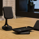 Left to right: The desk mount, the charging base, and the vent mount.